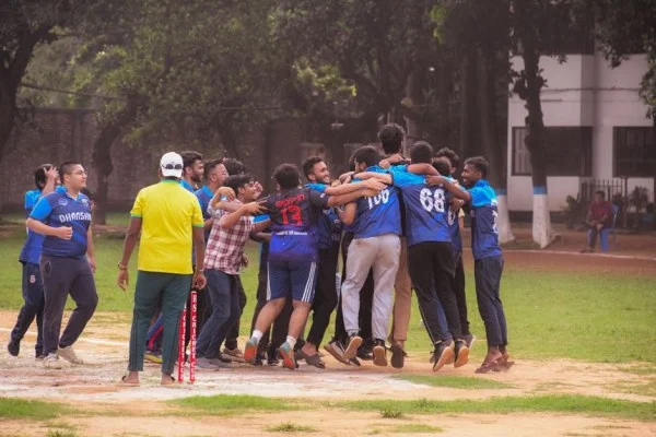 cricket team huddle